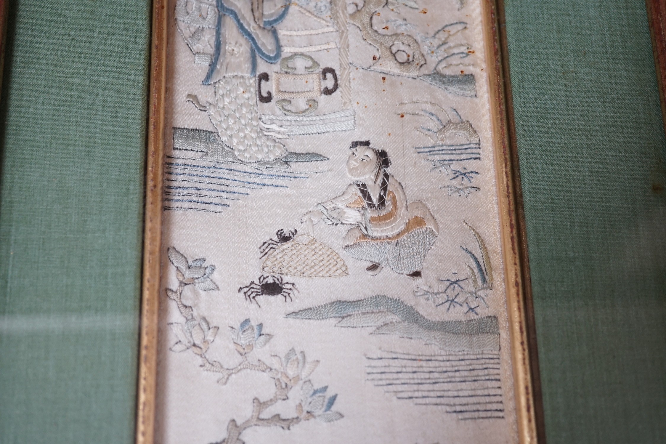 Three pairs of gilt framed, 19th century, silk embroidered, sleeve bands (for Chinese robes), 49cms long x 9cms wide (not including mount or frame)